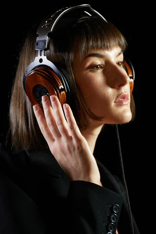 Woman wearing spirit torino mistral pro headphones