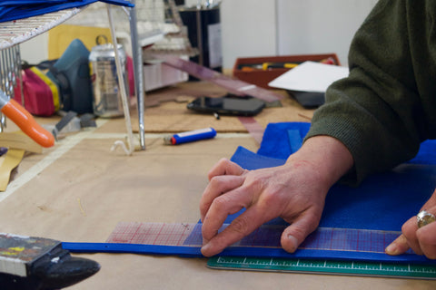 Assembling the Lotuff Leather Mini Sling backpack in electric blue