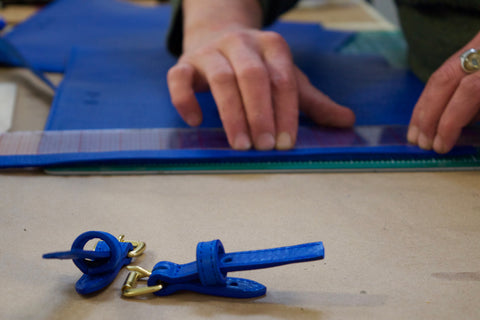 Assembling the Lotuff Leather Mini Sling backpack in electric blue