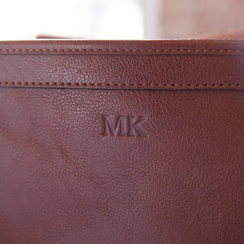 Leather Backpack embossed Monogram