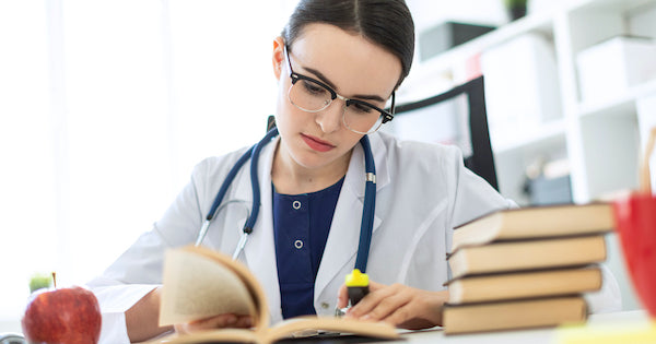 doctor reading a book