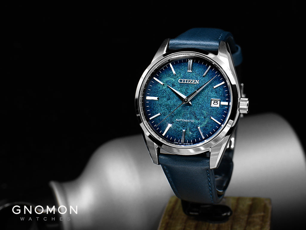 The textured aquamarine blue dial of Citizen Collection Silver Leaf Lacquer Dial Blue Ref. NB1060-12L