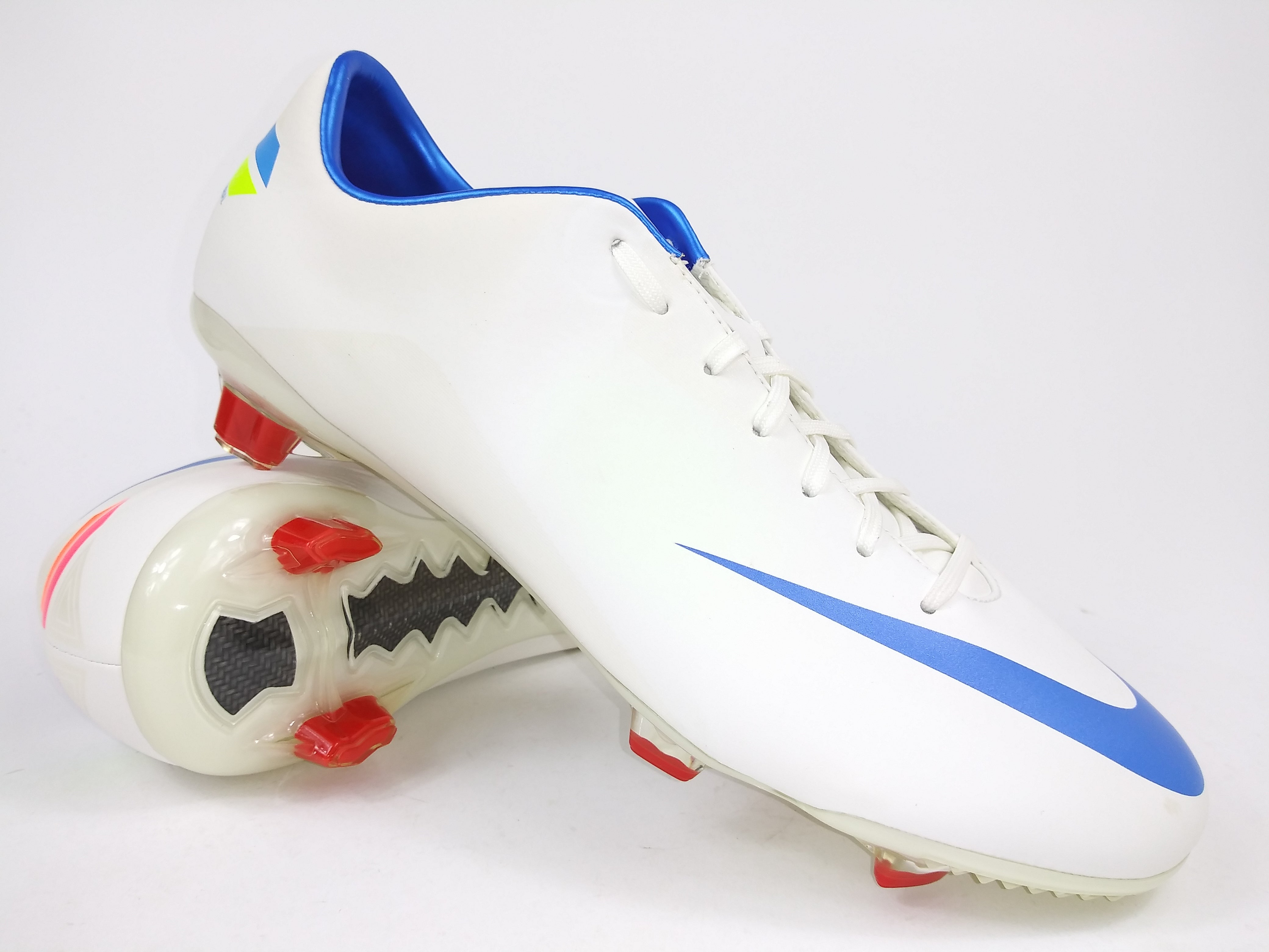 white and blue nike mercurial