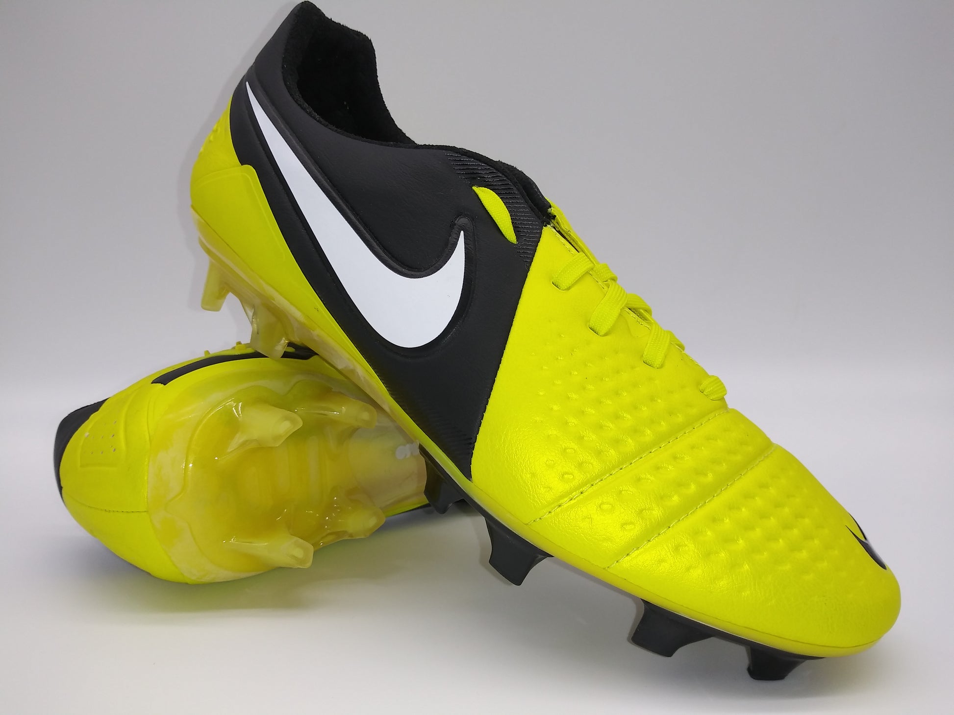 Stand Out on the Field with Nike Yellow and Black Shoes
