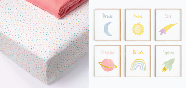 Pastel crib sheet and space theme wall art