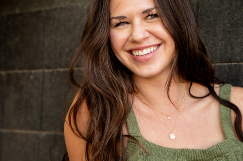 Girl with layered Gold Necklaces