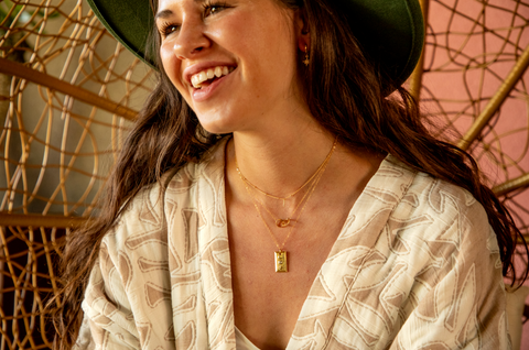 Girl With Layered Gold Necklaces