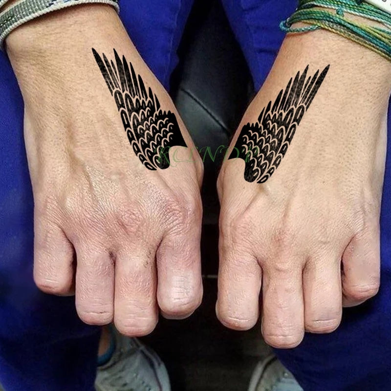 20 Wings Tattoos Wing tattoos on wrist Wrist tattoos for guys Wings tattoo