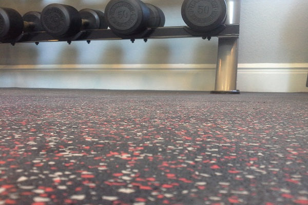 Workout Dumbells on a rubber gym floor