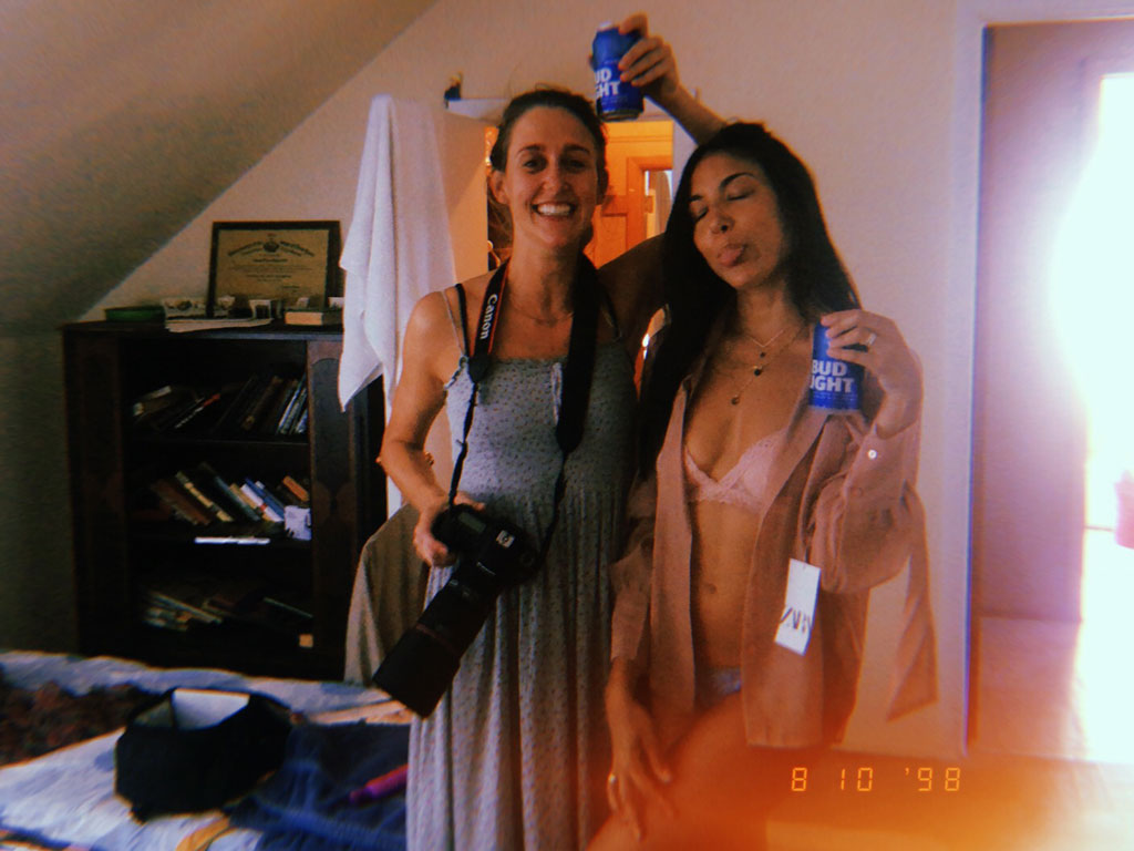 delia langan holding a camera and gaby yen