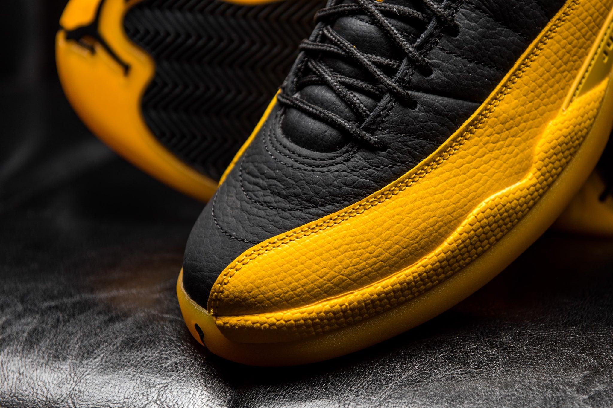 jordan 12 retro black and university gold