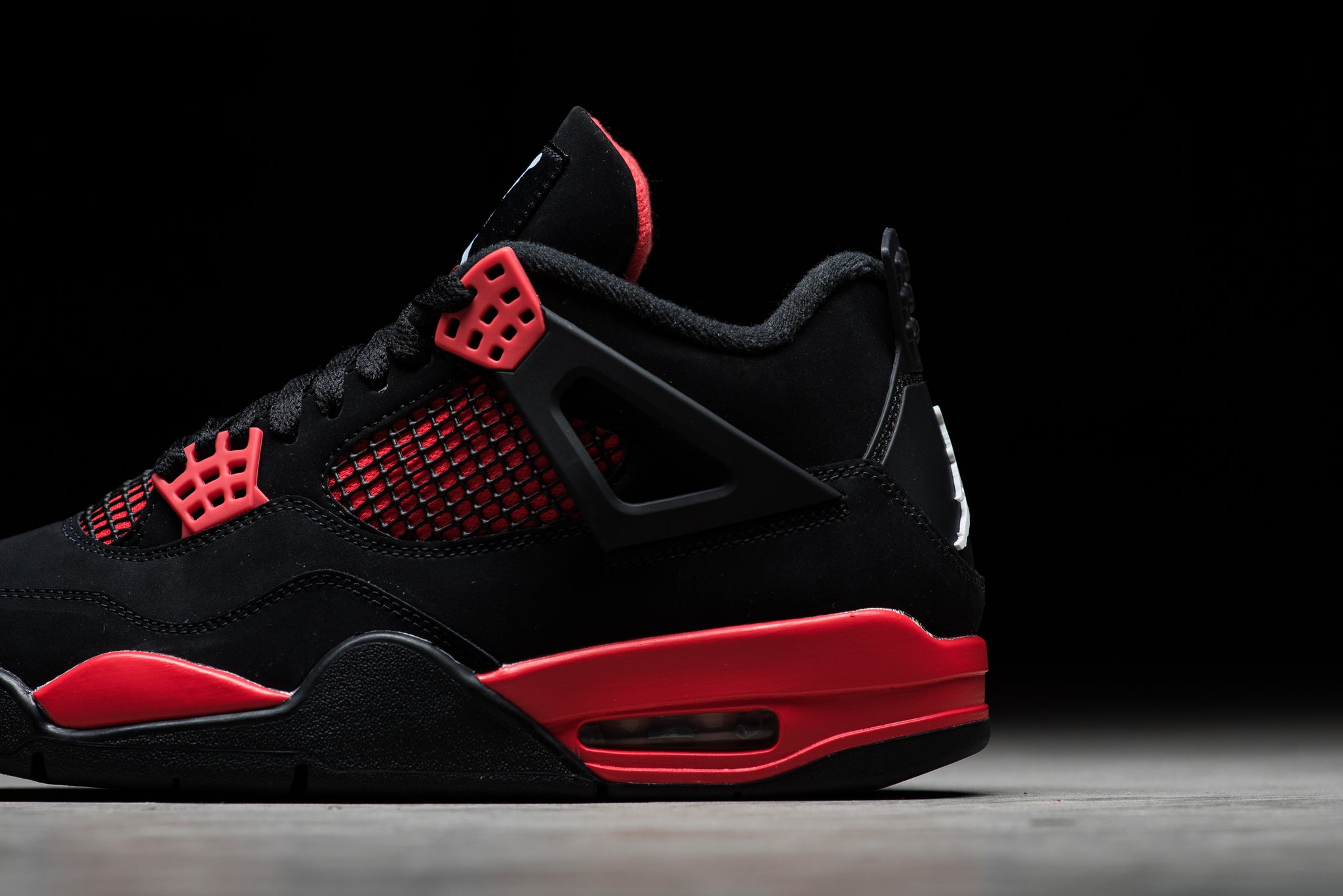 black and red jordans 4s