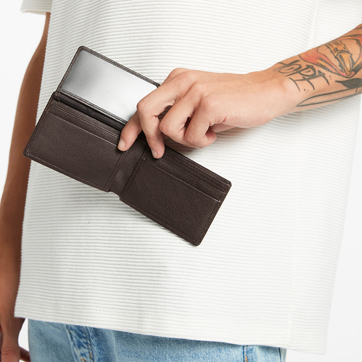 Jonah Men's Chocolate Leather Bi-Fold Wallet | Status Anxiety®