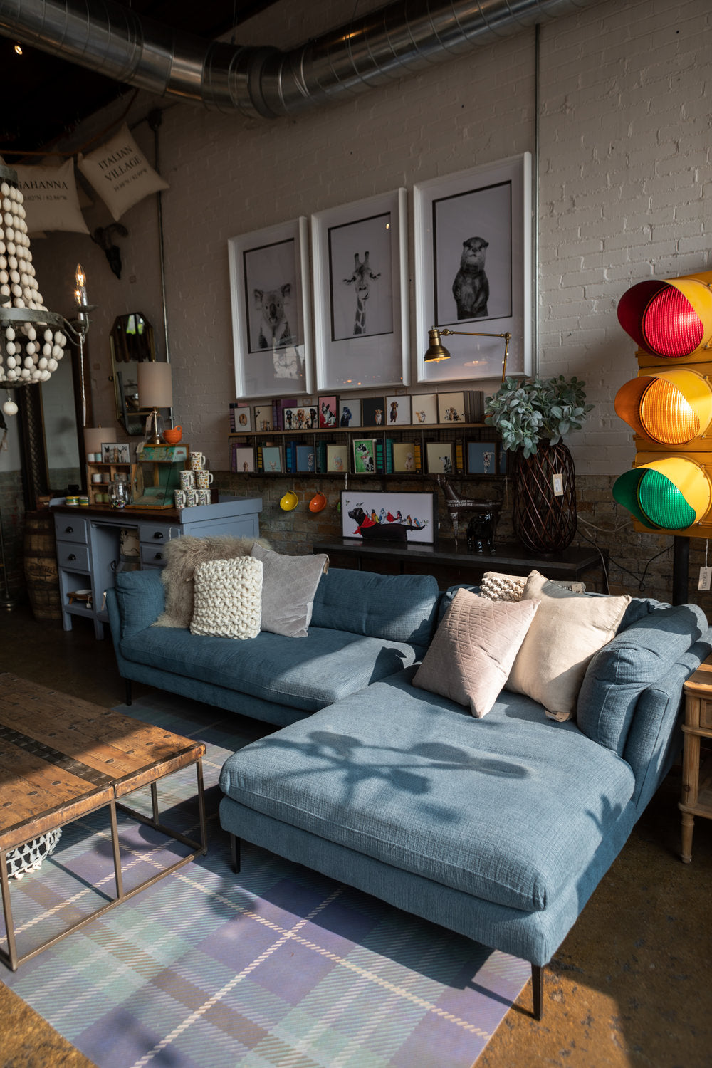 Blue couch and wooden table