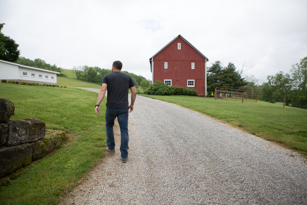 Daniel walking up the driveway