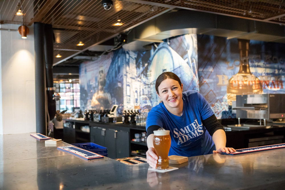 Jamie Fuchs serving a cold Session IPA