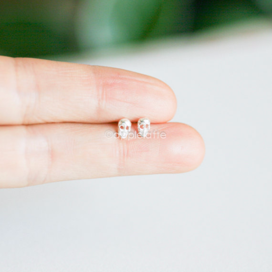 tiny skull earrings in sterling silver 