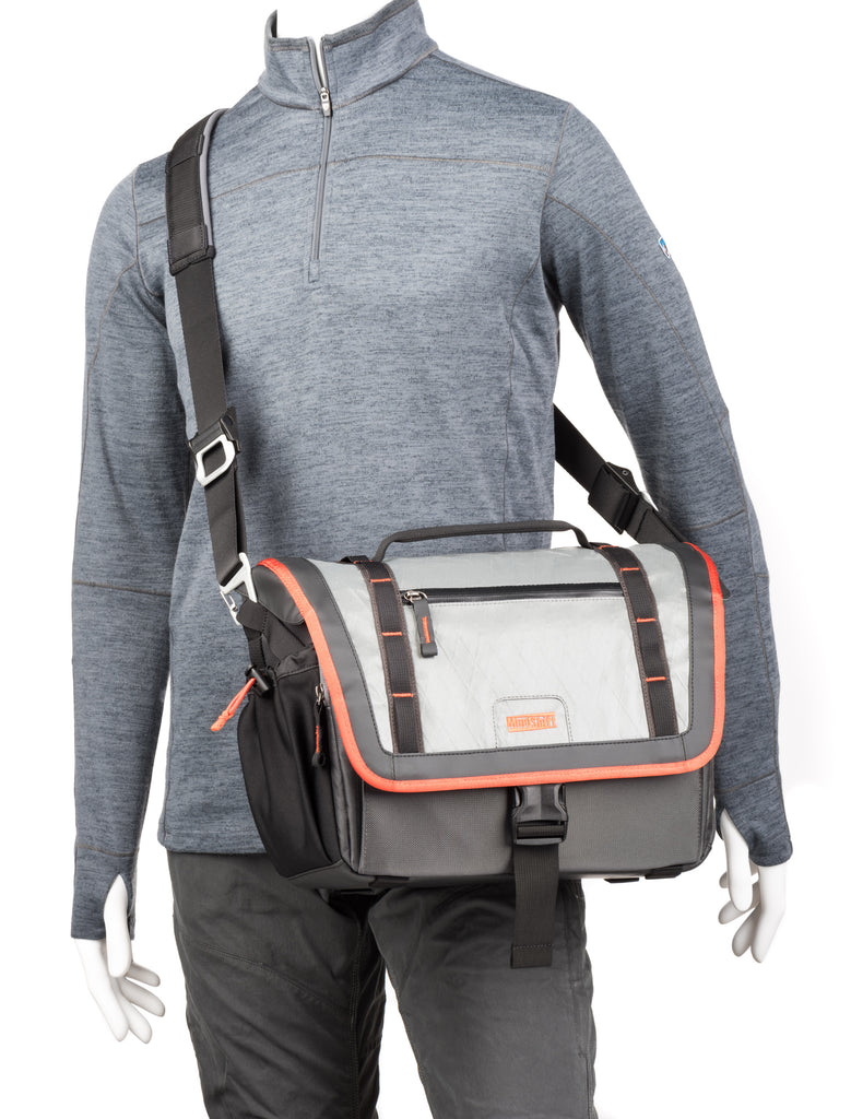 The MindShift Exposure shoulder bag, shown in "solar flare" is a storm-resistant carrying solution