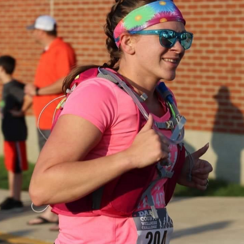 Woman at race in Ponya Bands Bamboo Terry Lined Sweatband