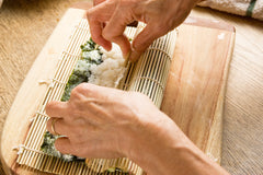 roll with sushi mat