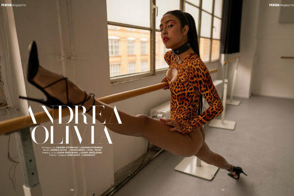 sexy ballet split with dancer wearing a leopard print thong bodysuit