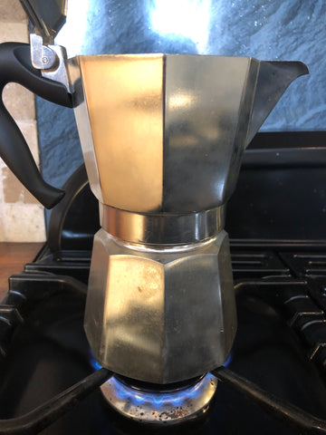 I used my Moka pot on an induction stove using a pot with some water in it.  After the brew, the bottom half of my Moka pot that was touching the hot
