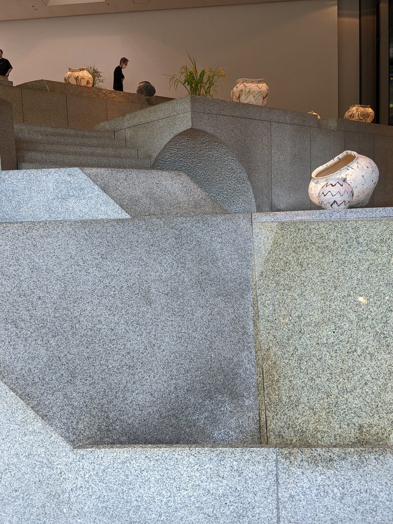Steps and curved forms in stone by Isamu Noguchi