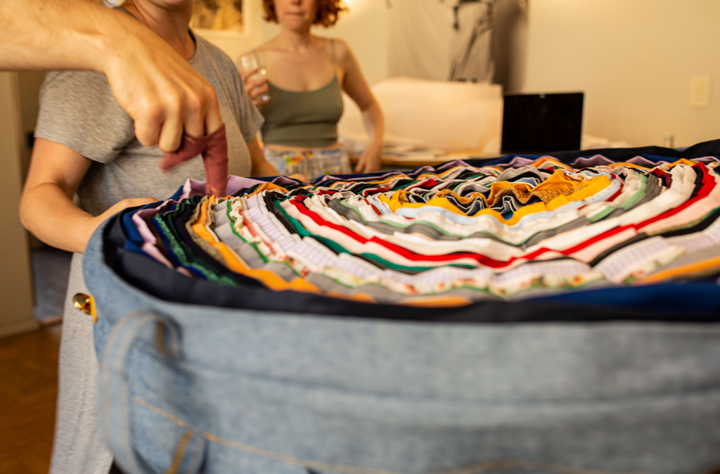 Finger puppets dance on many layers of colorful fabric.