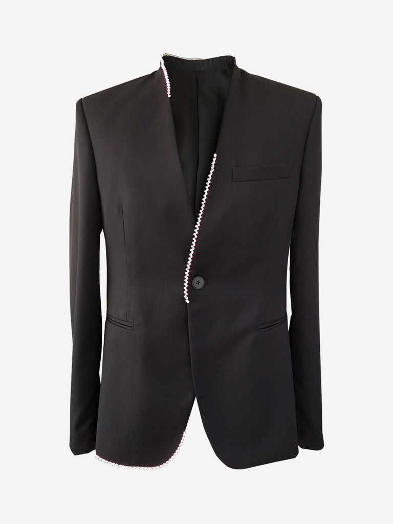 Black collarless mens suit jacket with white beads