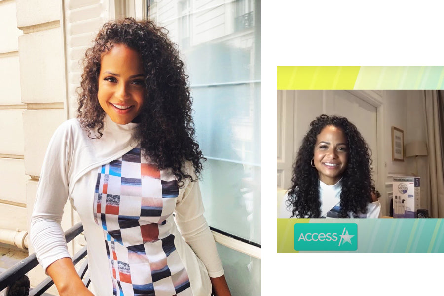 actress and singer christina milian wears white and checkered split dolman top by NOT by Jenny Lai
