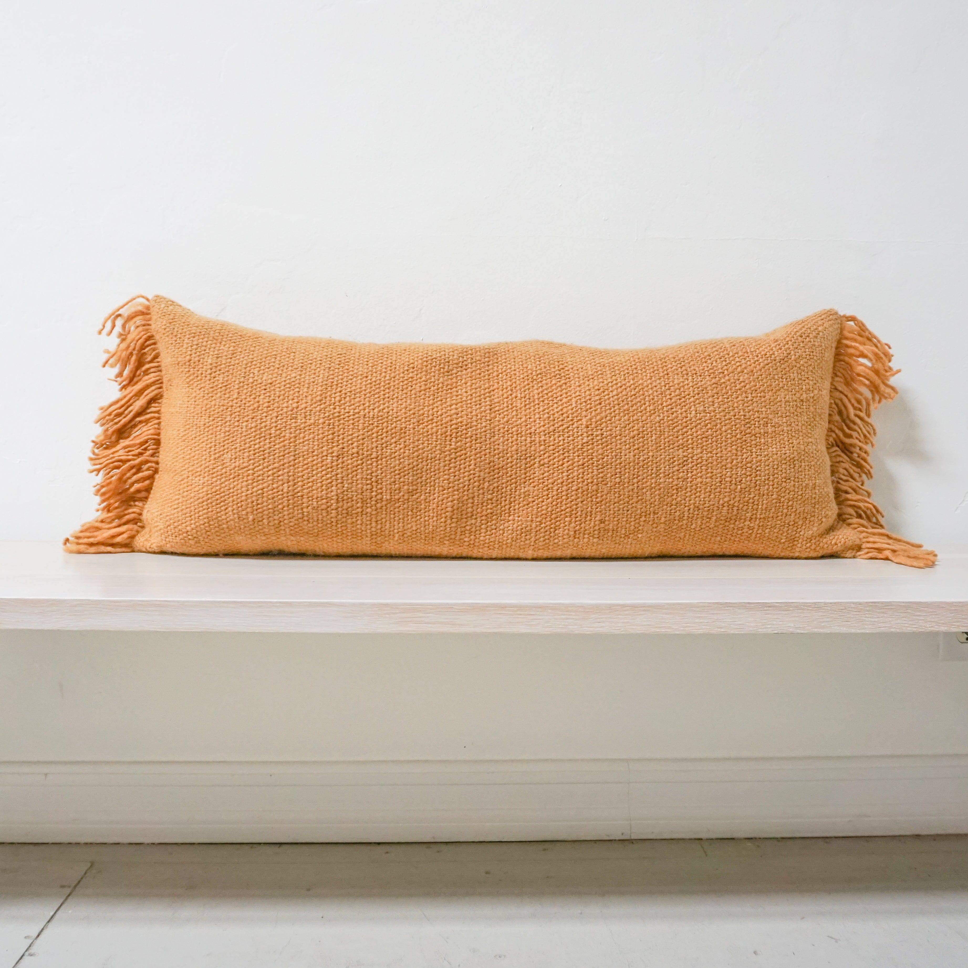 https://cdn.shopify.com/s/files/1/0216/5643/6836/files/treko-pillows-gold-moss-lumbar-pillow-with-tassels-by-treko-40556414304511.jpg?v=1698211537&width=3686