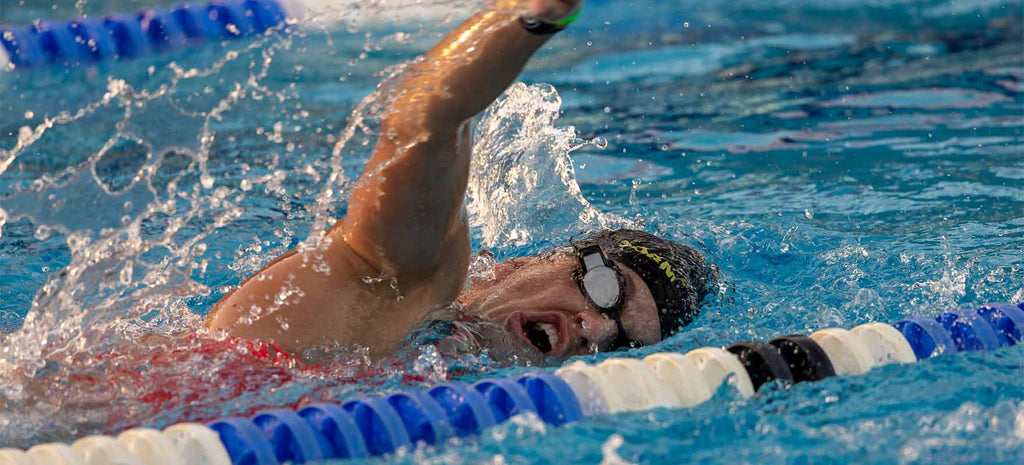 Swimmer training with the FORM Smart Swim Goggles