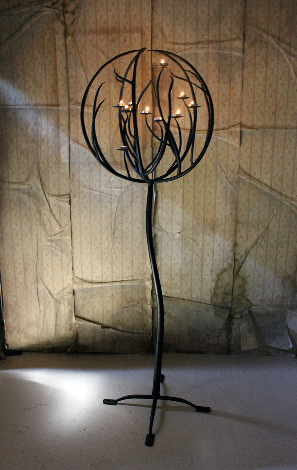 A Large 20thc Black Wrought Iron Floor Standing Ten Sconce Sphere