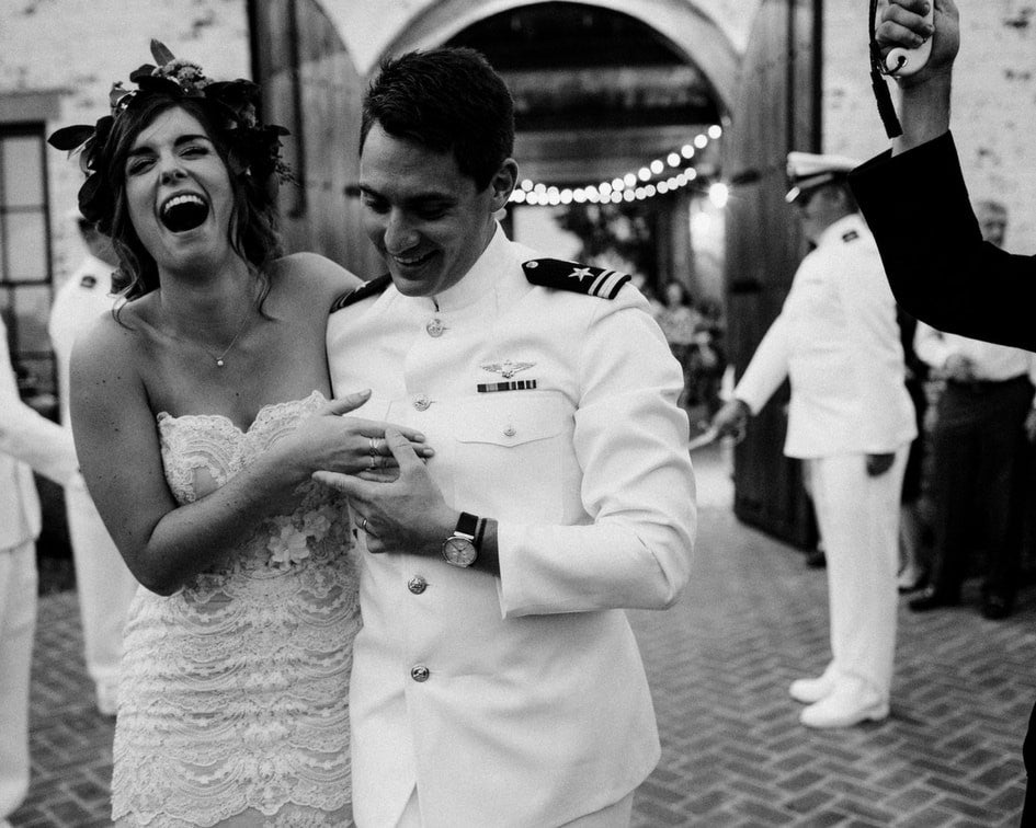 bride and groom laughing