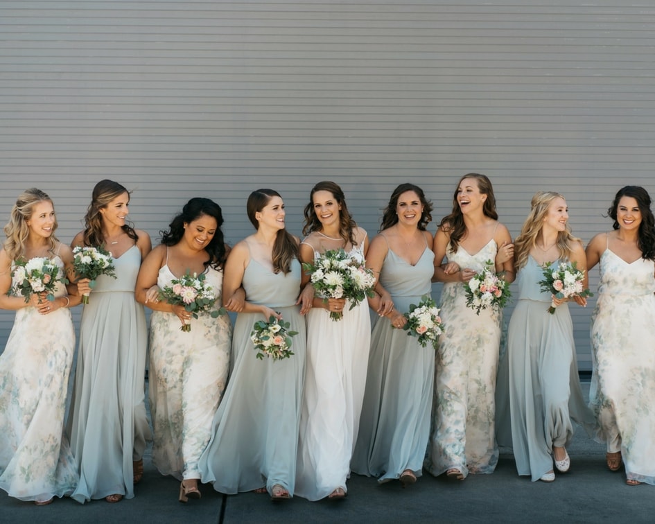 bride with coordinating bridesmaid dresses 