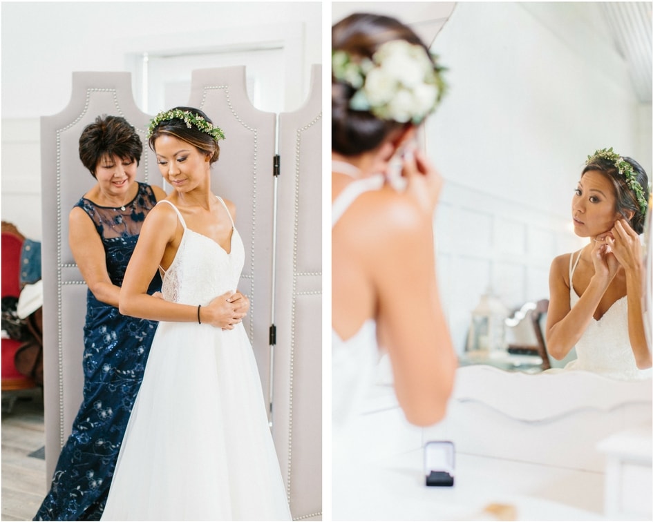 bride getting ready with the mother of the bride 