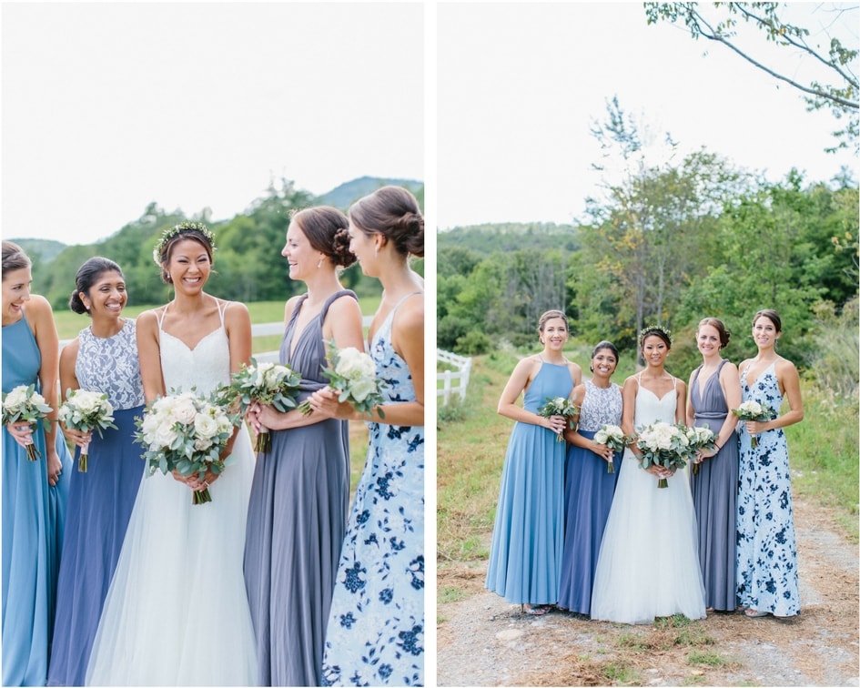 bride with bridesmaids wearing long blue bridesmaid dresses 