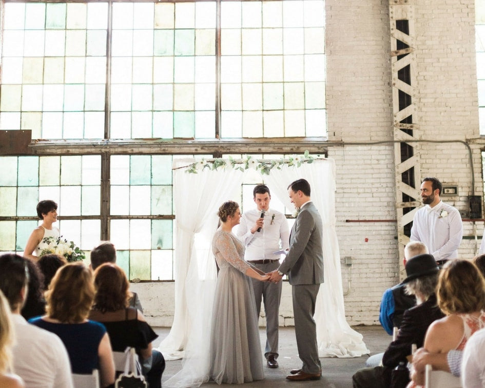 bride in grey lace wedding dress