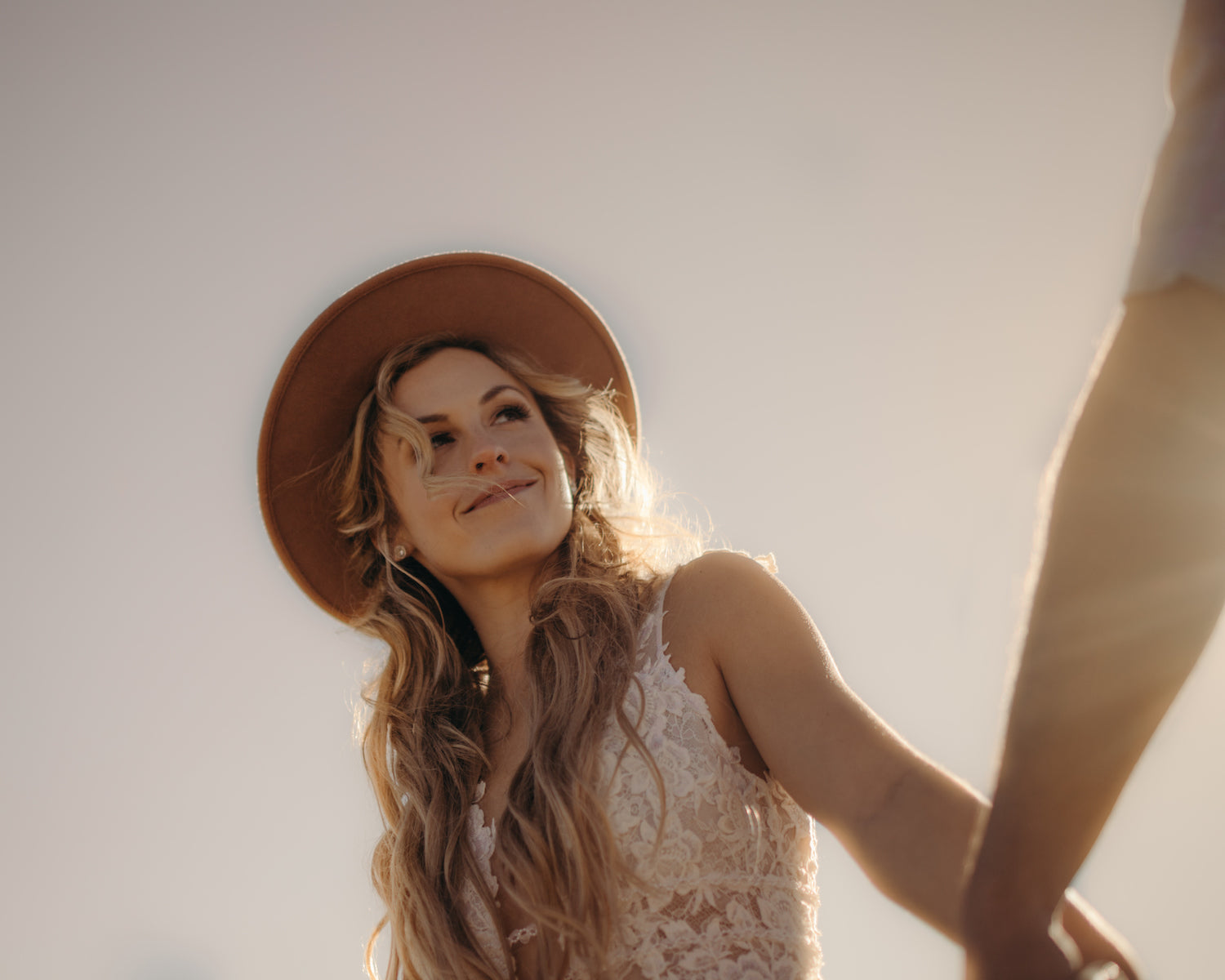 lace wedding dress with boho hat 