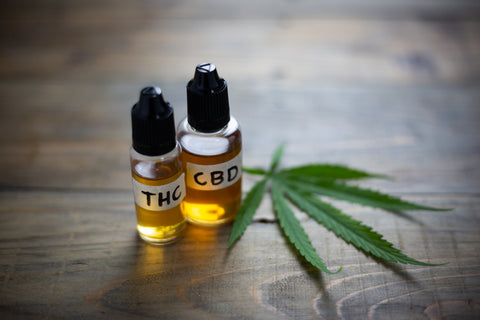 Medicinal cannabis with extract oil in a bottle