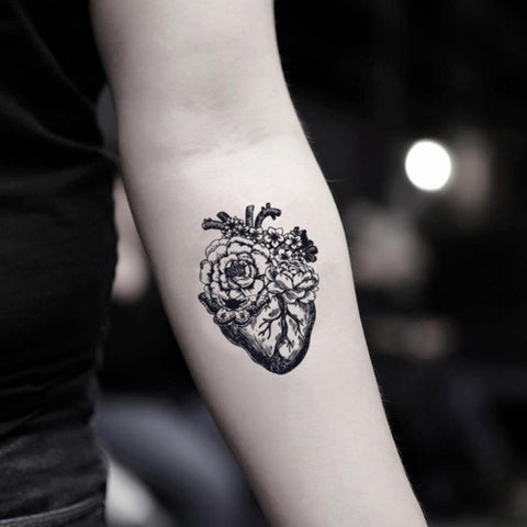 Columbine flower tattoo by Phil Robertson TattooNOW