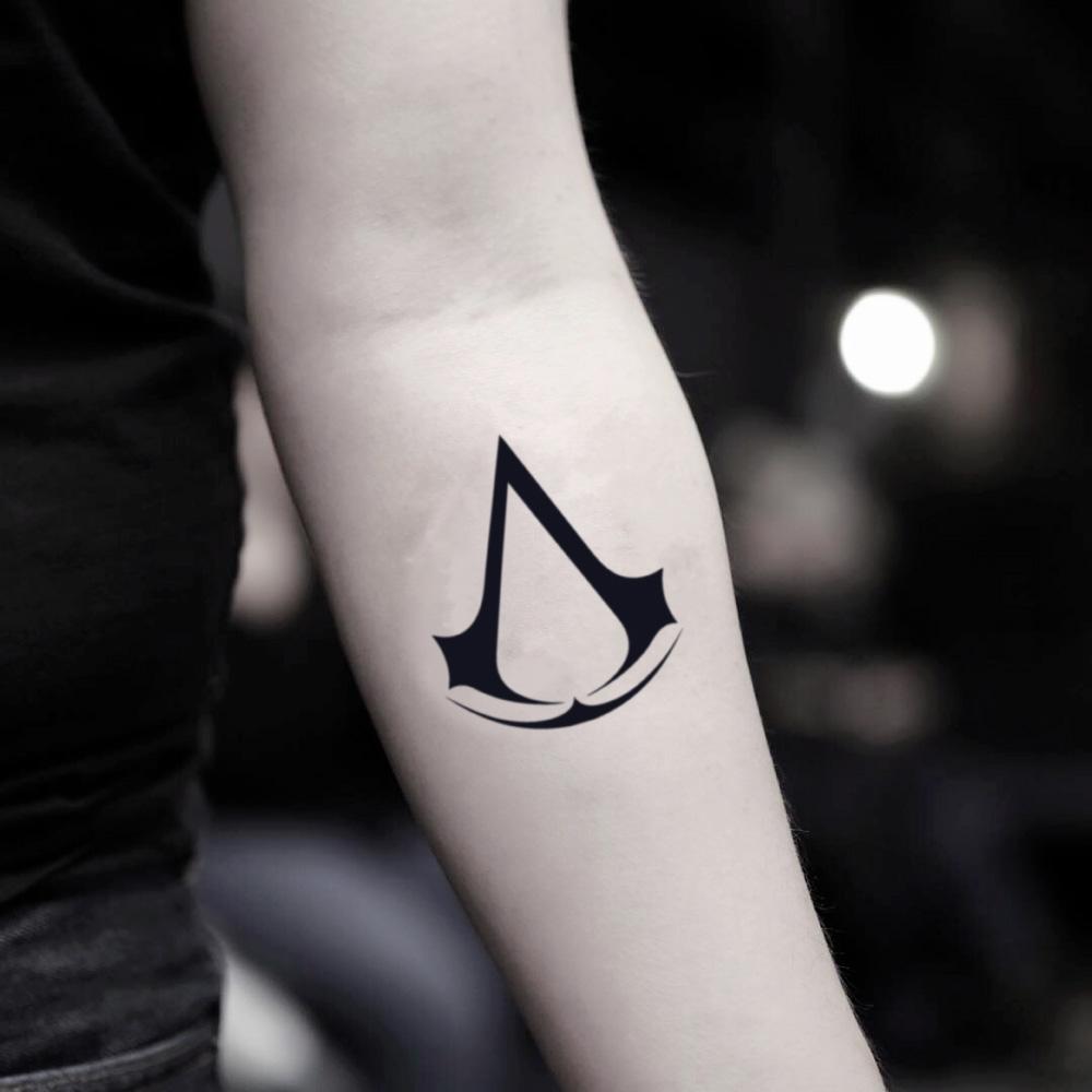 Featured image of post Assassin s Creed Symbol Tattoo 30 unique assassins creed tattoos