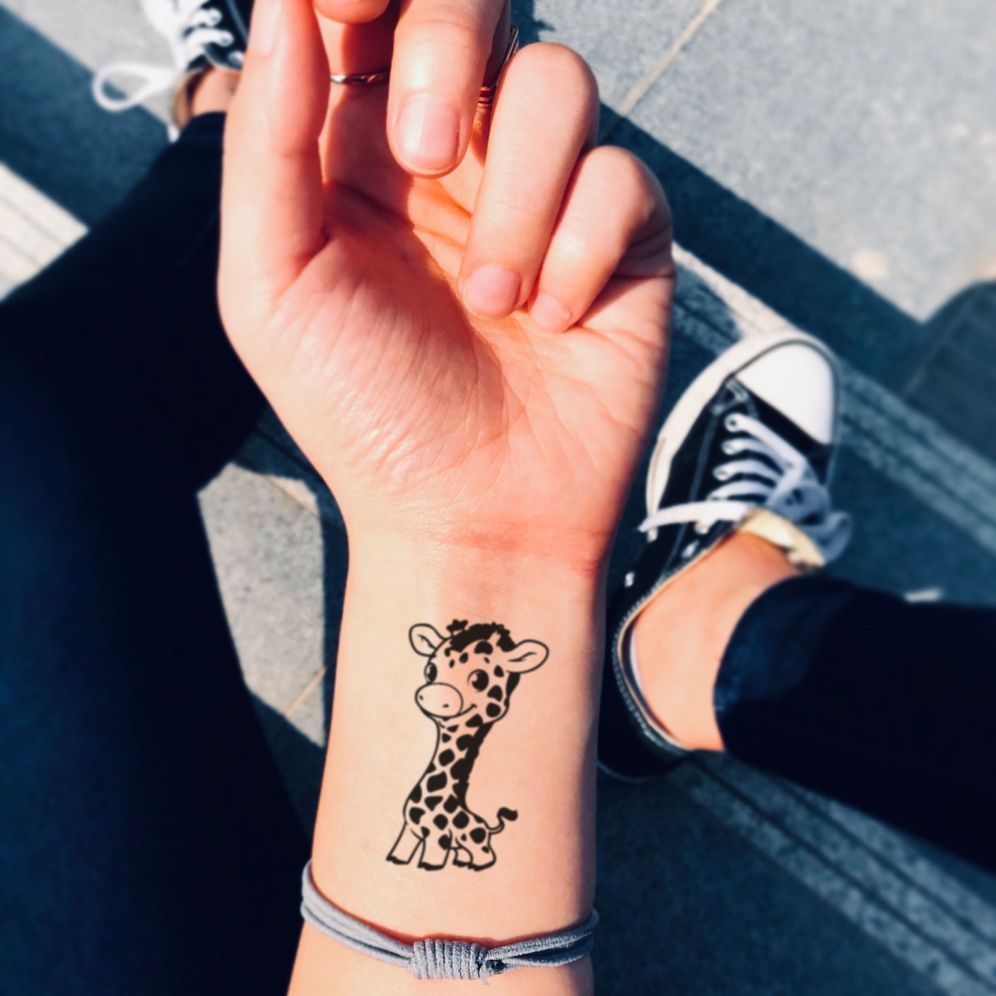 Giraffe tattoo  Giraffe tattoos Tattoos for daughters Mom tattoos