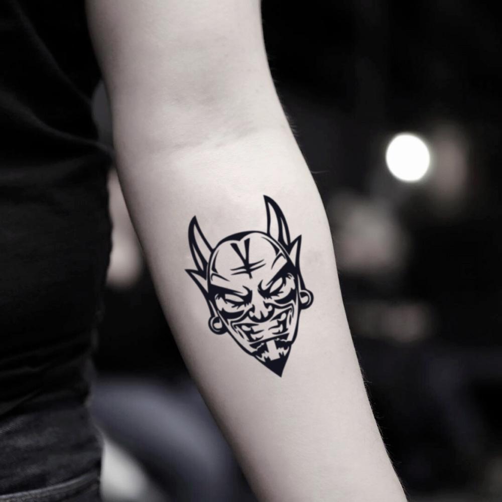 demon silhouette tattoo