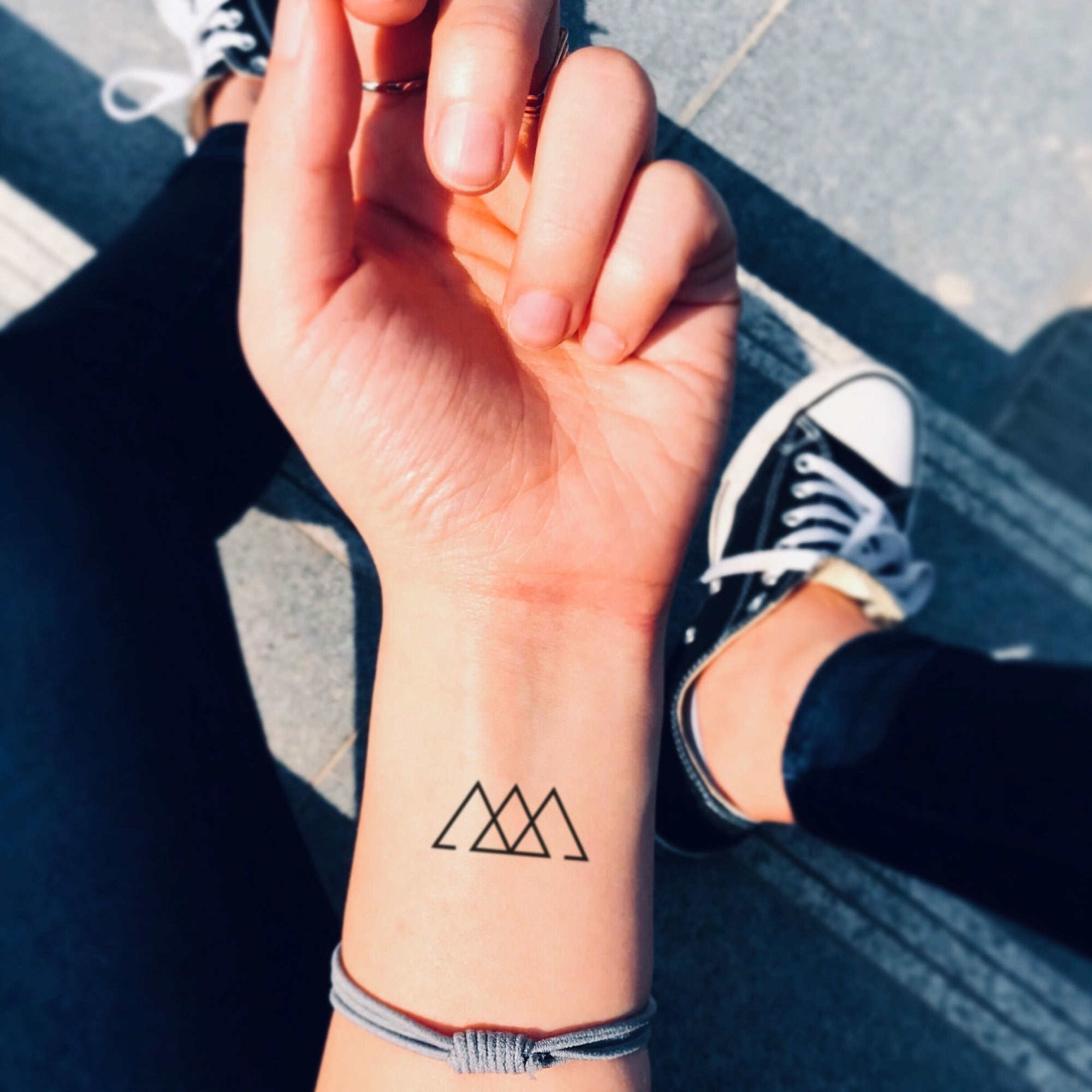 Triangle matching tattoos for siblings