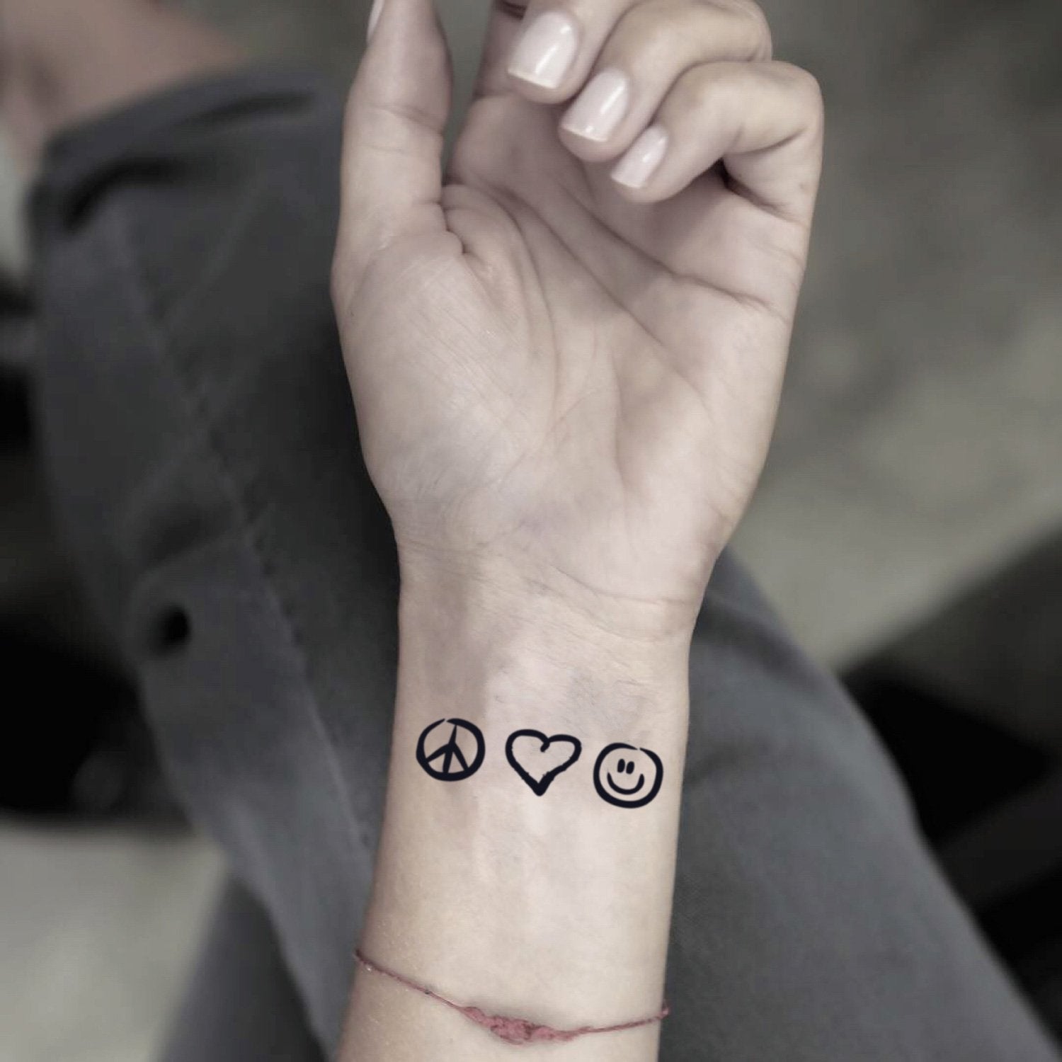 Peace Love And Music Tattoos On Wrist