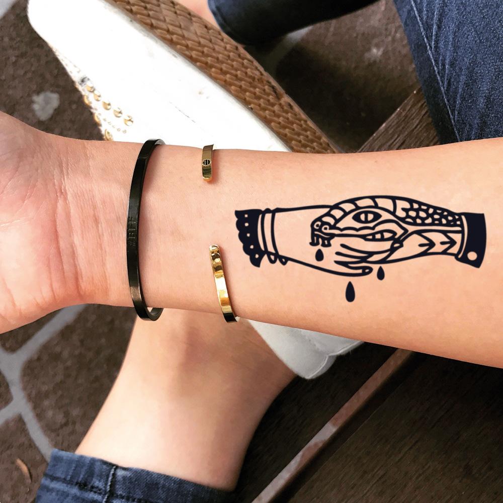 Cast Iron Tattoos on Instagram Done by kstattoos snake hand handshake  snakebites trustnoone flower colortattoo color tattoo tattoos  tattooartist tattooshop