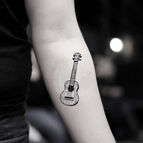101 Awesome Guitar Tattoo Ideas You Need To See  Guitar tattoo design  Music tattoo designs Guitar tattoo