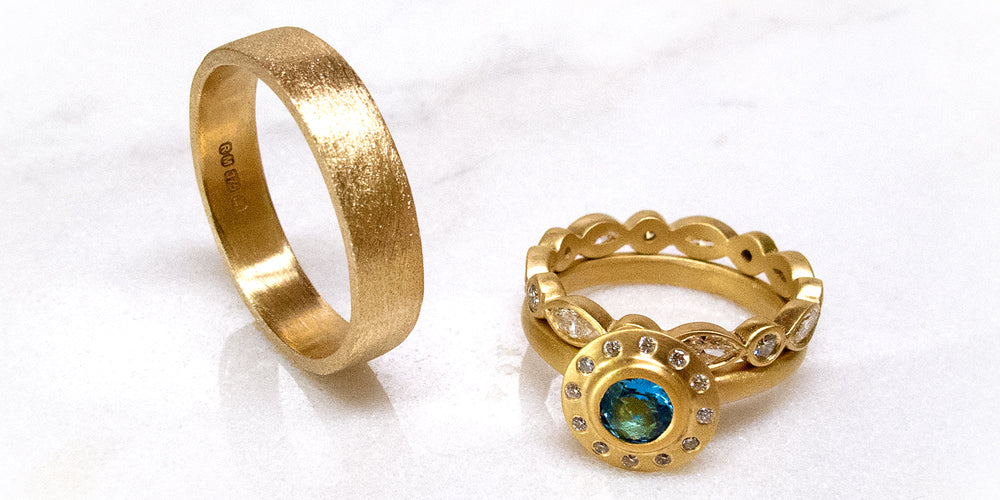 Aquamarine and diamond wedding rings