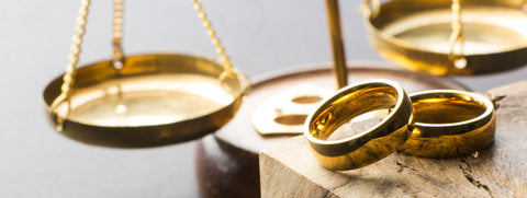 Gold rings on scales at bullion dealer